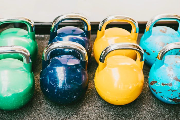 Rows of dumbbells in the gym
